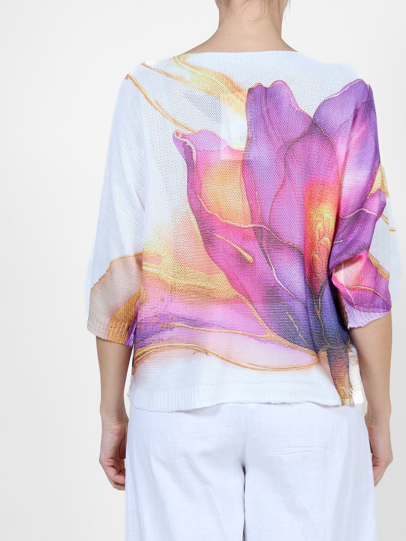 Haut blanc à imprimé floral audacieux violet, rose et jaune