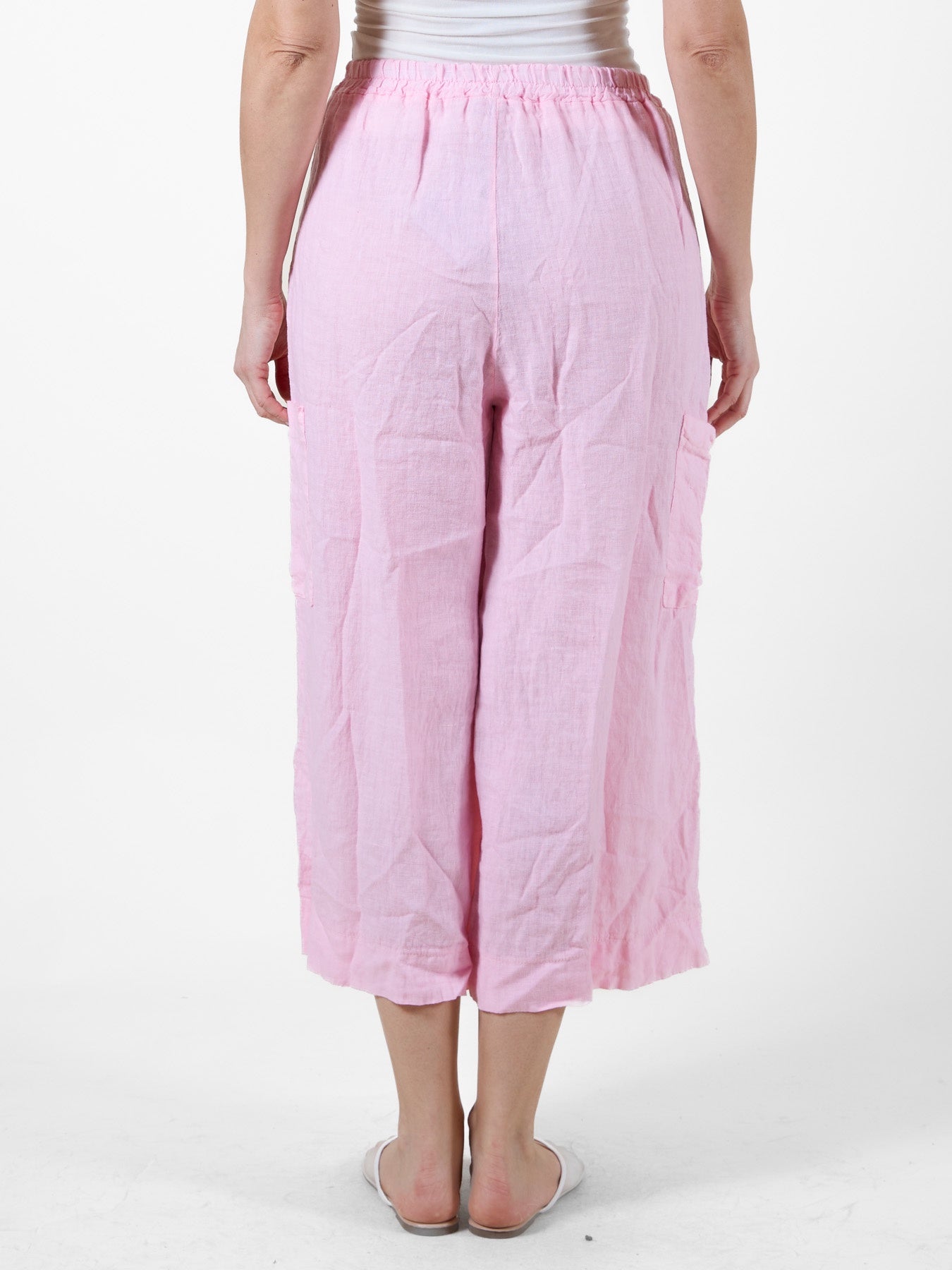 Pantalon de plage court et fluide à nouer sur le devant, couleur œillet