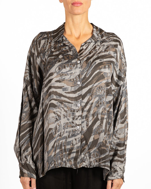 Haut imprimé animalier à boutons en pierre sur le devant