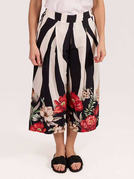 Pantalon noir 3/4 imprimé zèbre avec bord floral
