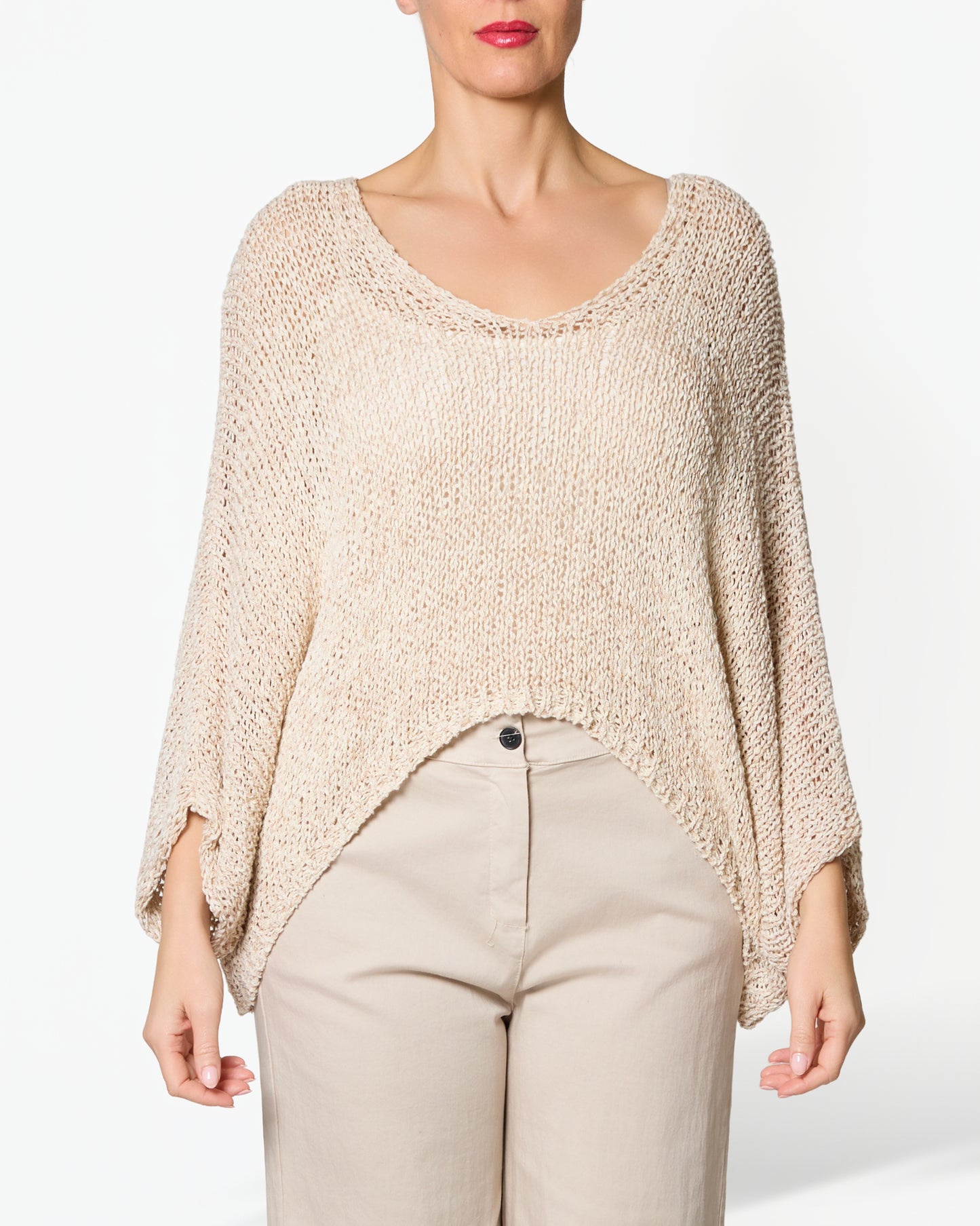 Pull beige à col en V à épaules tombantes et ourlet à motif chiné