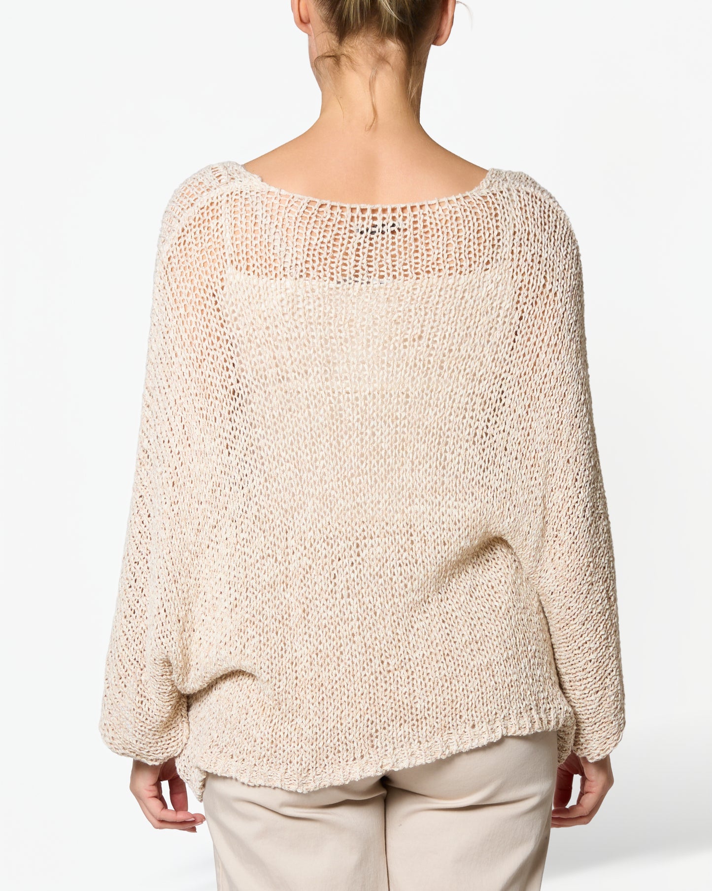 Pull beige à col en V à épaules tombantes et ourlet à motif chiné