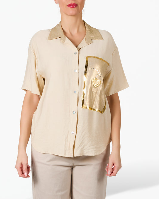 Blouse beige à boutons avec motif graphique doré