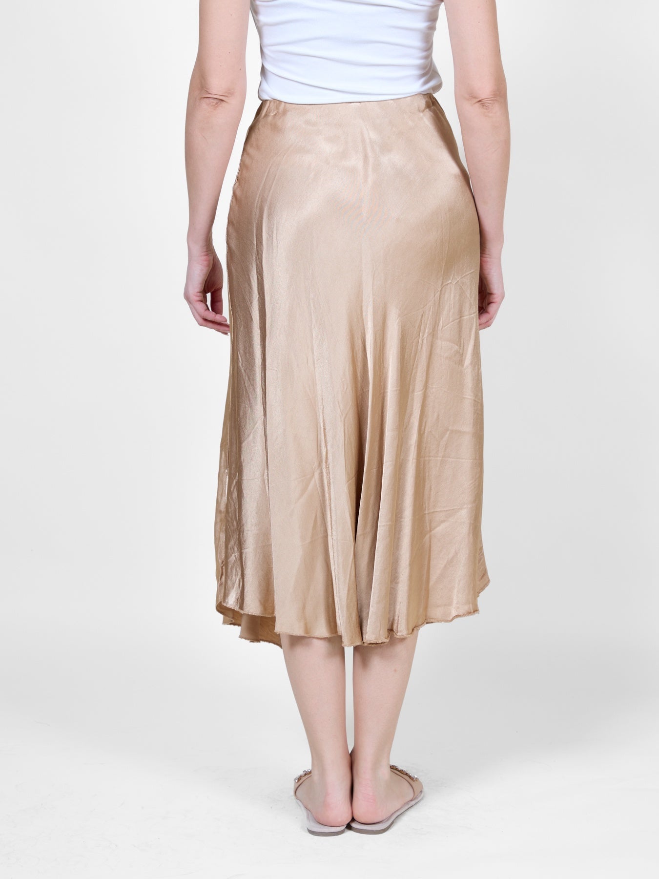 Jupe longue beige avec un léger brillant