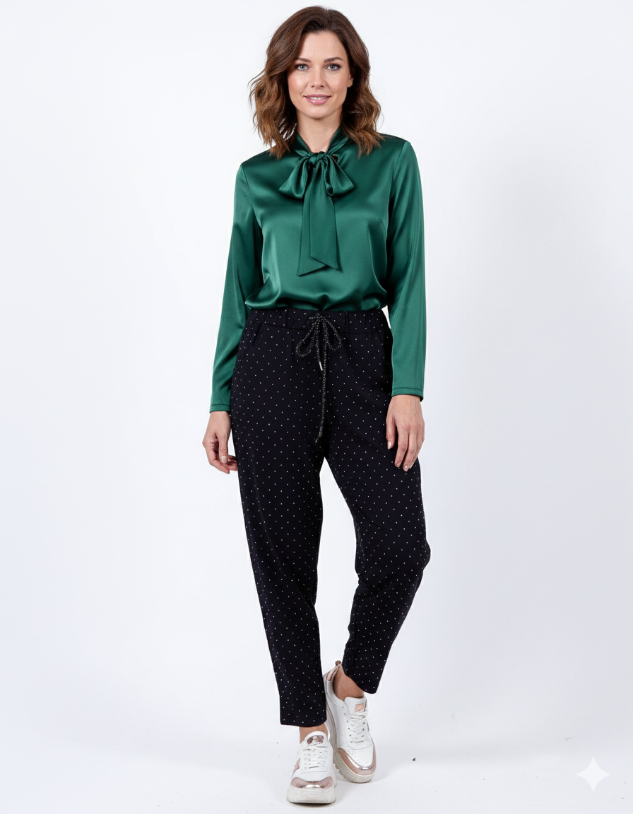 Pantalon noir à cordon de serrage et entièrement orné de strass
