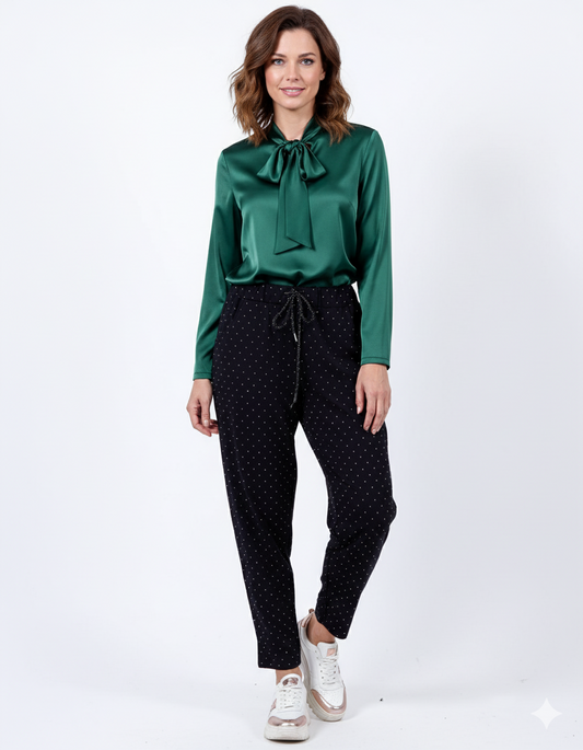 Pantalon noir à cordon de serrage et entièrement orné de strass