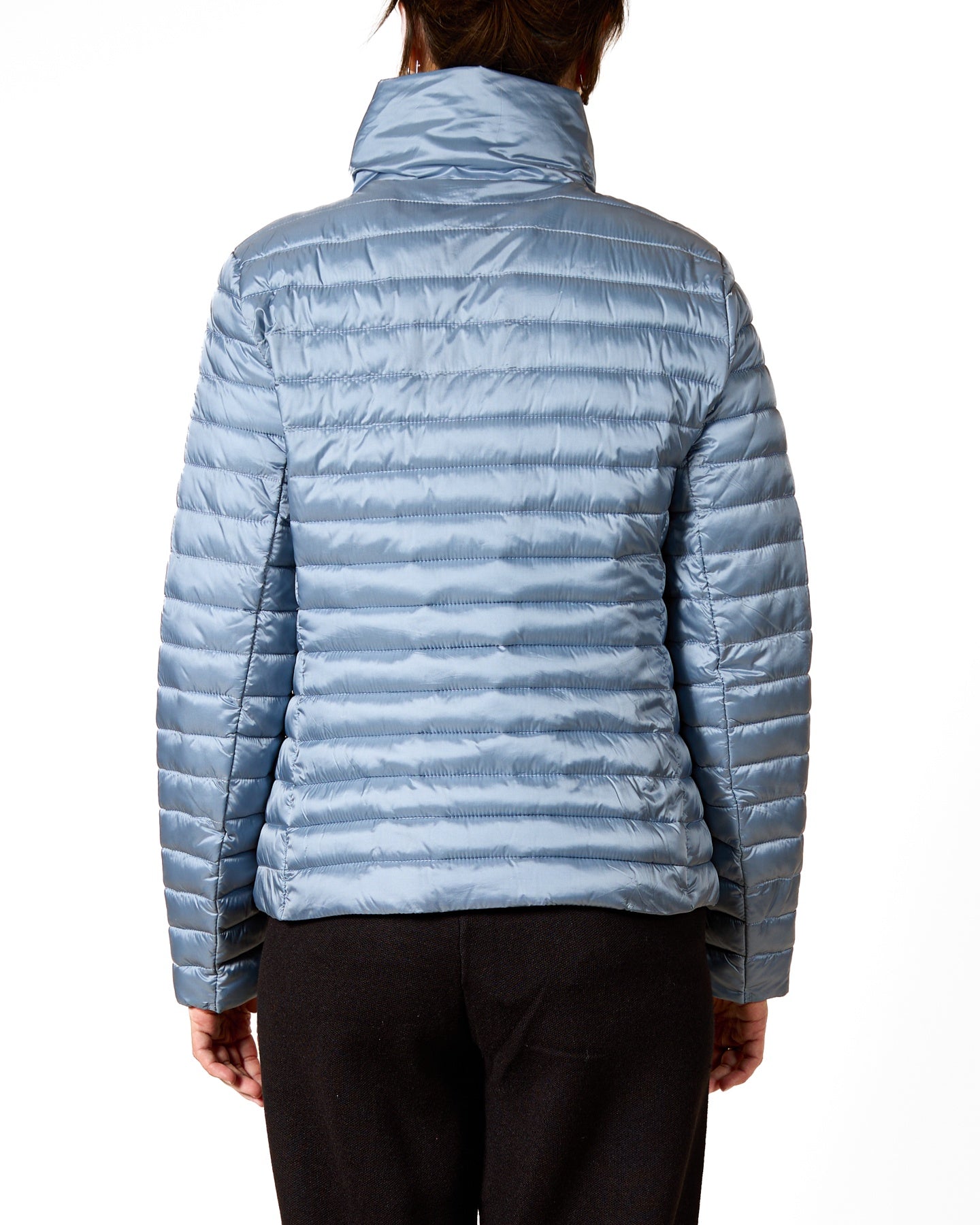 Manteau matelassé asymétrique bleu ciel à fermeture éclair et détails à volants
