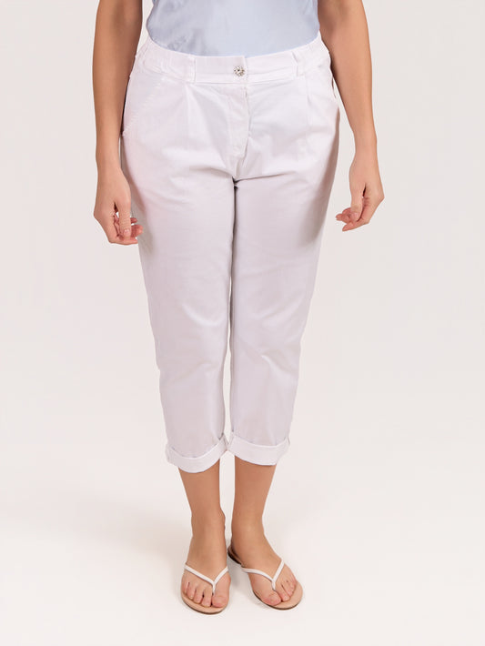 Pantalon blanc à boutons strass avec fermeture éclair à l’avant