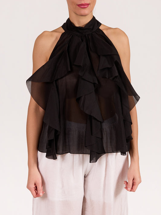 Blouse noire sans manches avec nœud et volants à l’avant