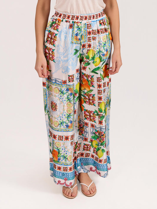 Pantalon bleu en satin à enfiler imprimé oranges et citrons
