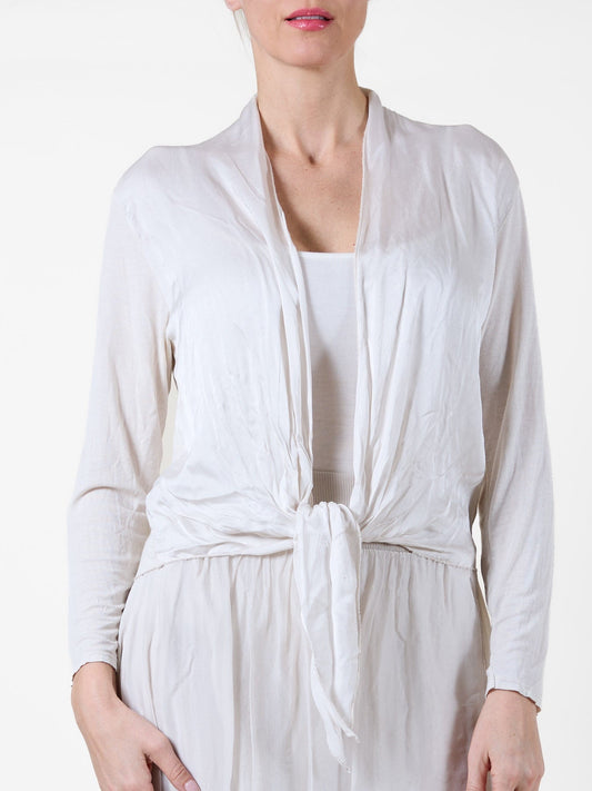 Boléro à manches longues couleur sable avec nœud sur le devant