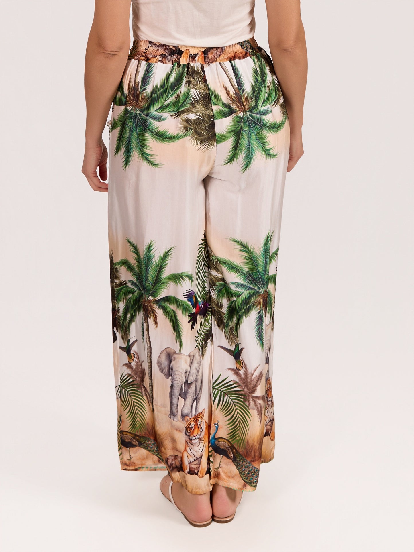 Pantalon vert à enfiler en satin avec imprimé jungle