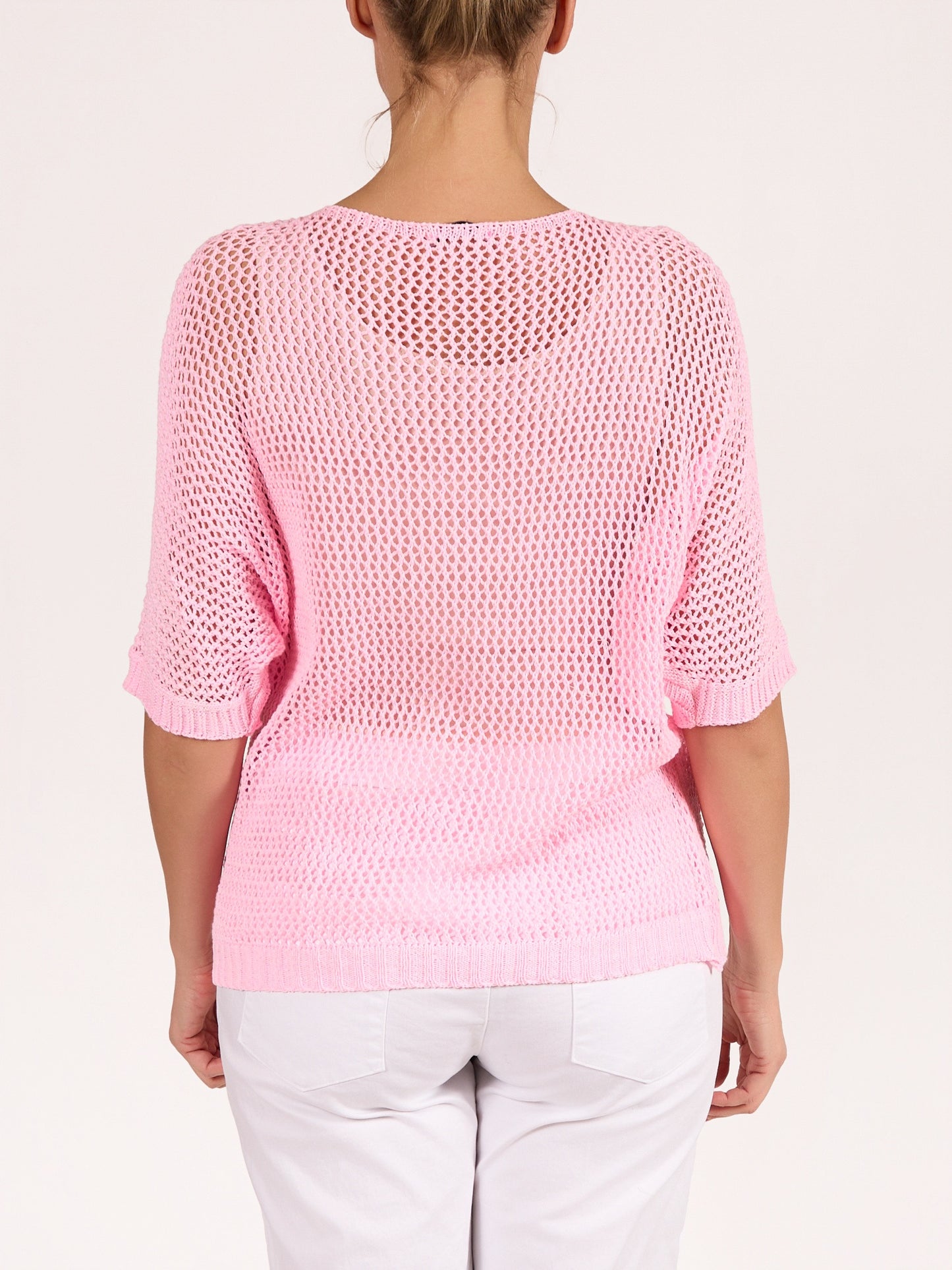 Pullover rose en crochet à col en V avec motif cœur